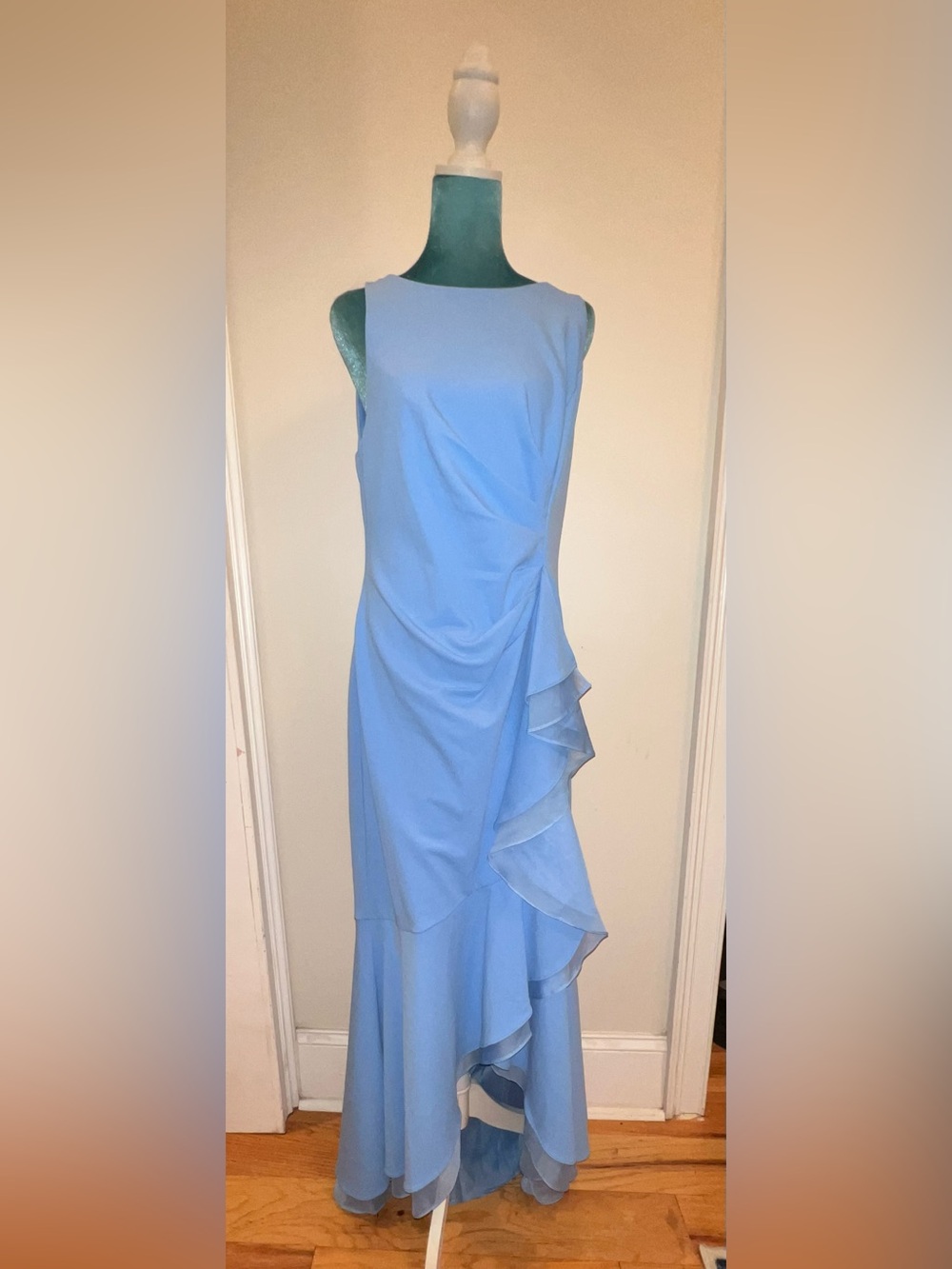 High-Low Crepe Halter Gown. NWT. Size: 12.
Retail: $229. Asking:$129.